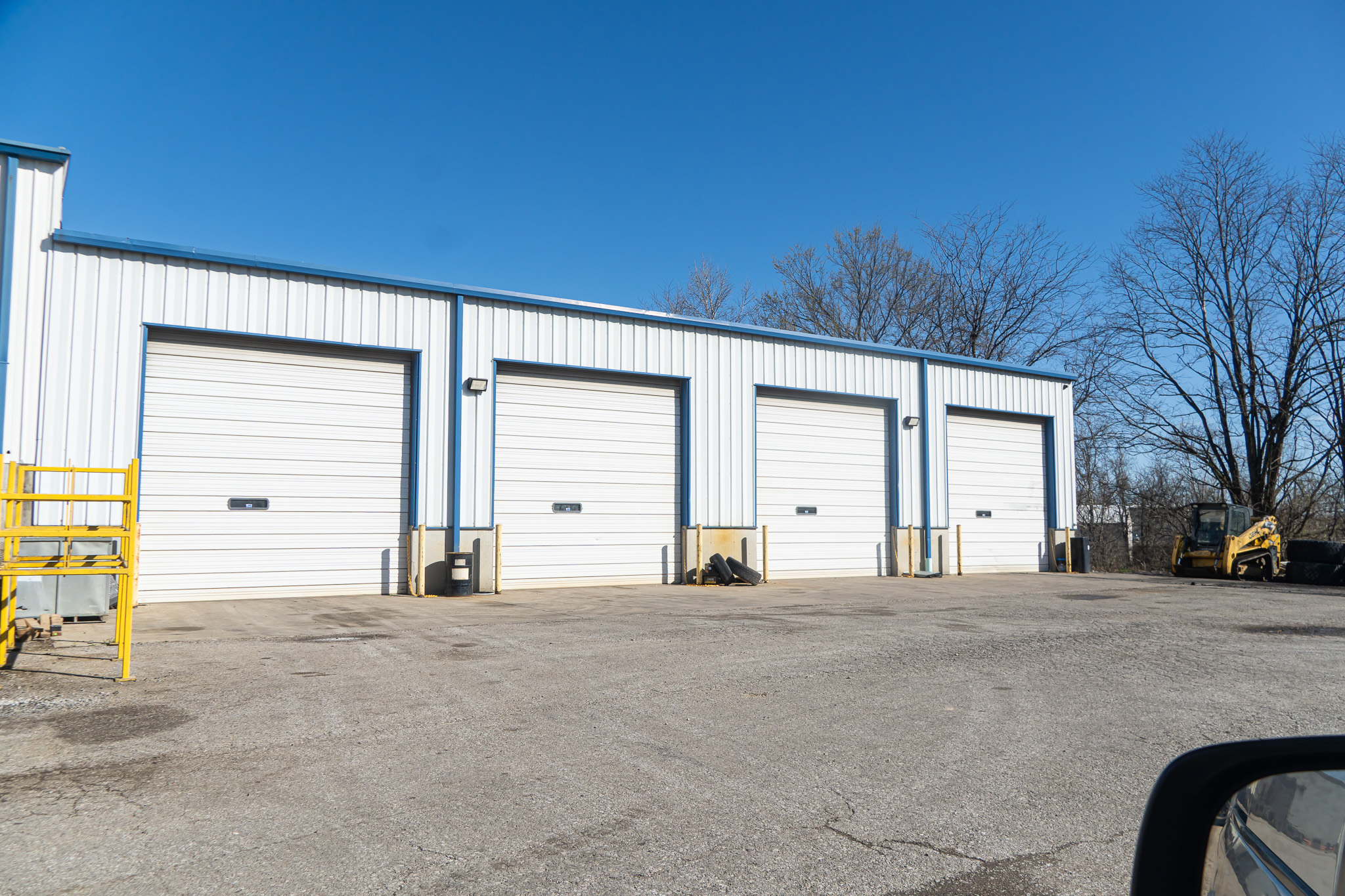 Four large service bay doors at Bluegrass Diesel Specialists in Burlington, KY